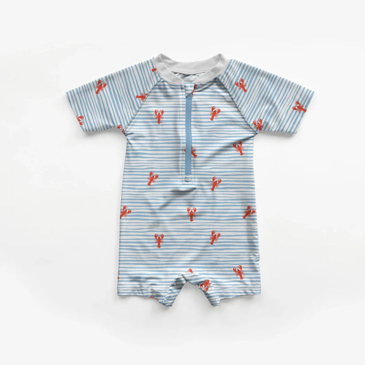 White swim fabric with playful red lobsters and blue wavy stripes – Oeko-Tex certified stretch knit for swimwear, kids’ beachwear, and nautical-themed projects