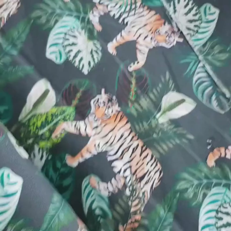 Tiger in the Jungle with Tropical Leaves on Dark Green