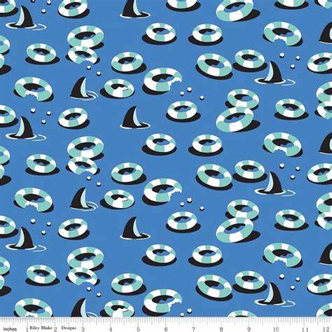 Blue Riley Blake quilting cotton with shark fins, life rings, and bubbles allover print
