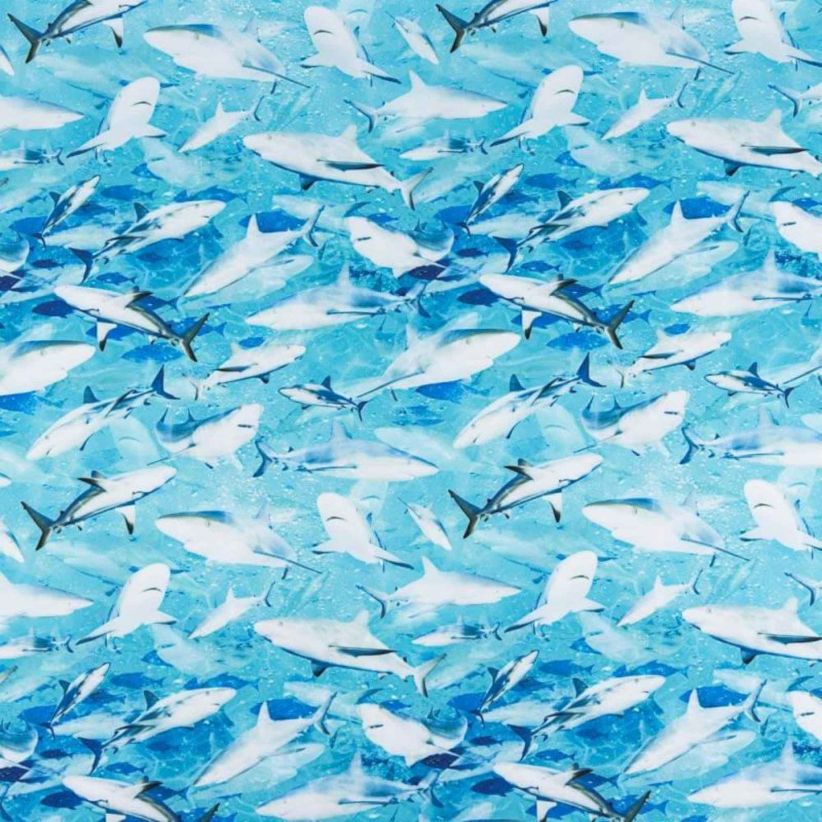 Blue swim fabric with realistic shark print swimming in ocean water – Oeko-Tex certified stretch knit for kids’ swimwear, rash guards, and beachwear