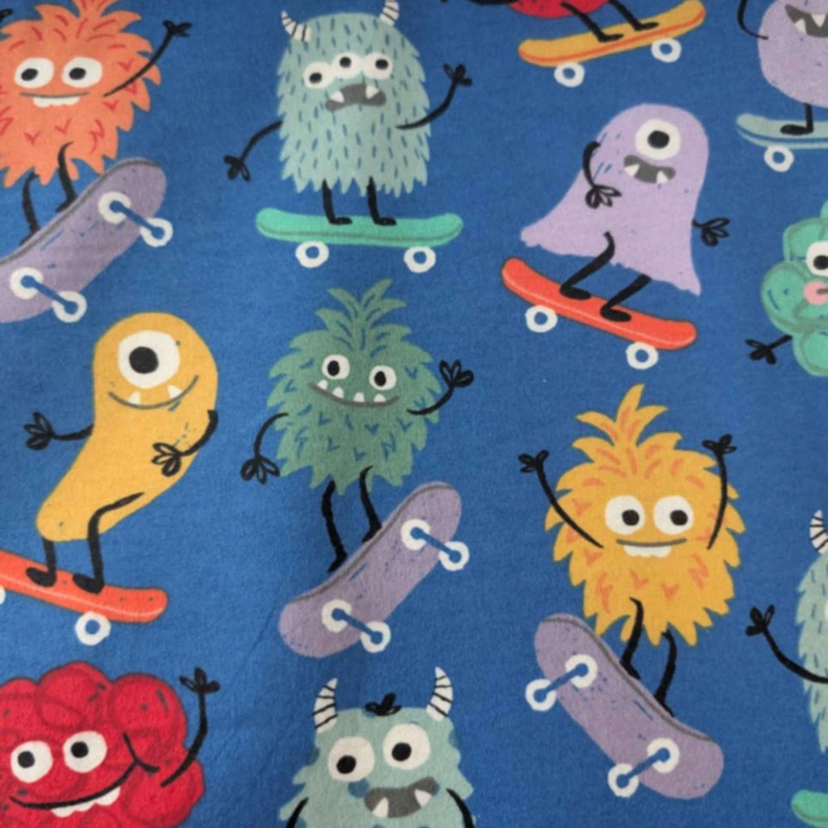 Skateboarding Monsters Cotton Flannel Fabric – Blue | Oeko - Tex Certified