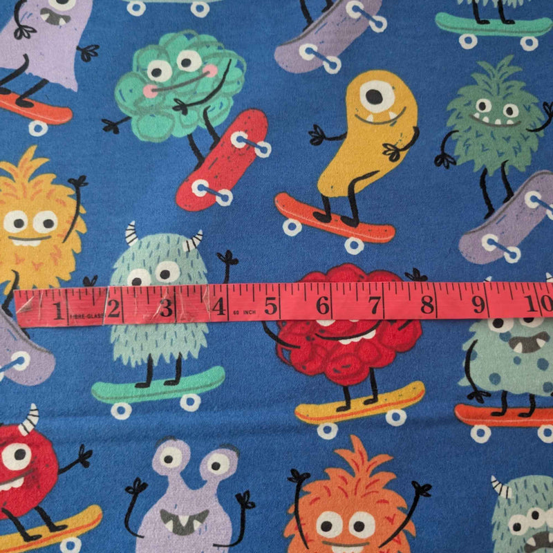 Skateboarding Monsters Cotton Flannel Fabric – Blue | Oeko - Tex Certified