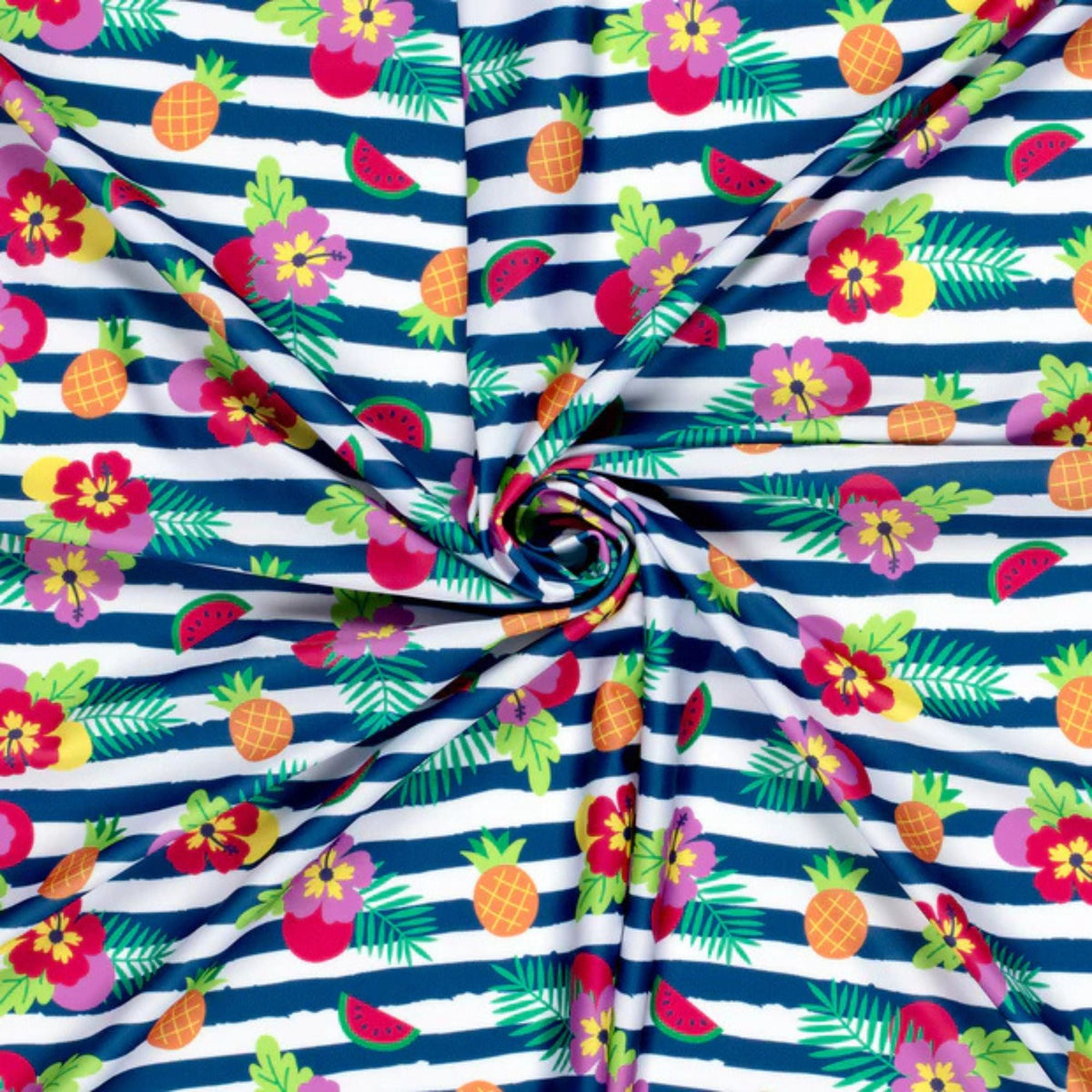 Bold tropical swim fabric with hibiscus flowers, pineapples, and fruit on navy and white stripes – Oeko-Tex certified stretch knit for swimwear and beachwear"