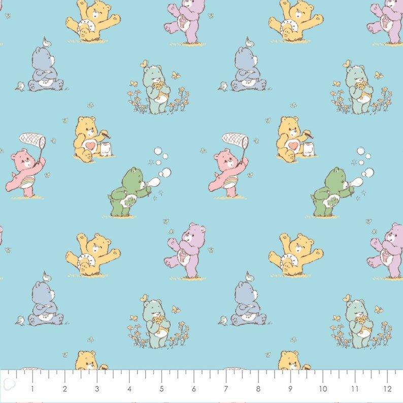 Care Bears Flannel Fabric on Blue