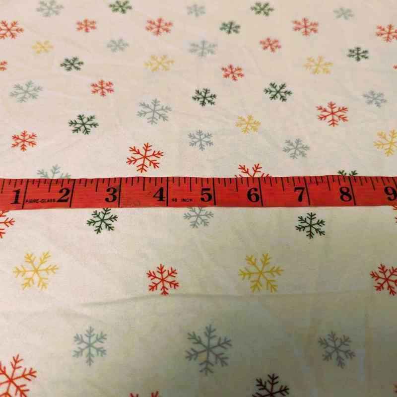 Colorful Snowflakes FLANNEL on Cream | Fabric Design Treasures