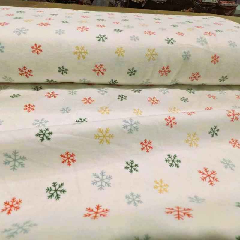Colorful Snowflakes FLANNEL on Cream | Fabric Design Treasures
