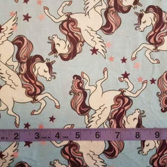 Flying Unicorn Flannel Fabric on Blue Flannel