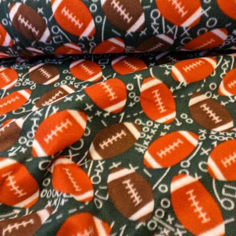 Footballs on Green Anti-Pill Polar Fleece