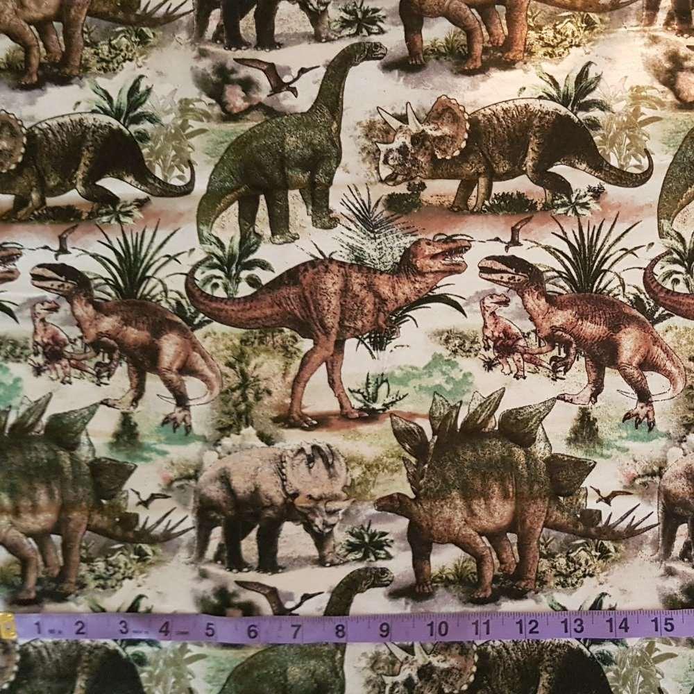 Packed Dinosaurs on Beige FLANNEL Fabric, Dinosaur Flannel - Fabric Design Treasures
