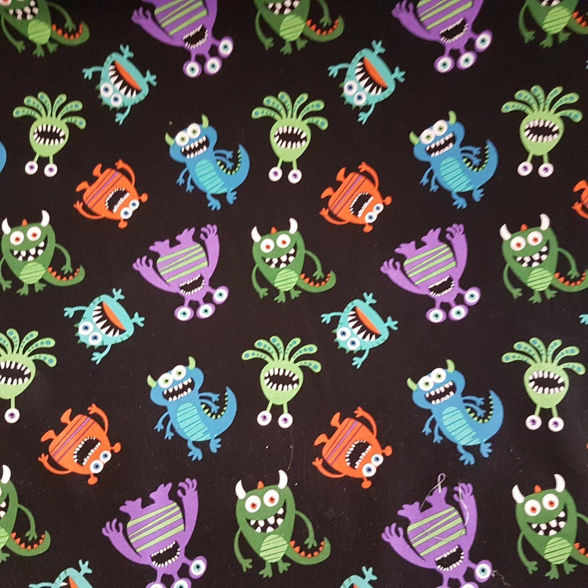 Tossed Doodle Monster Fabric on Black | Fabric Design Treasures