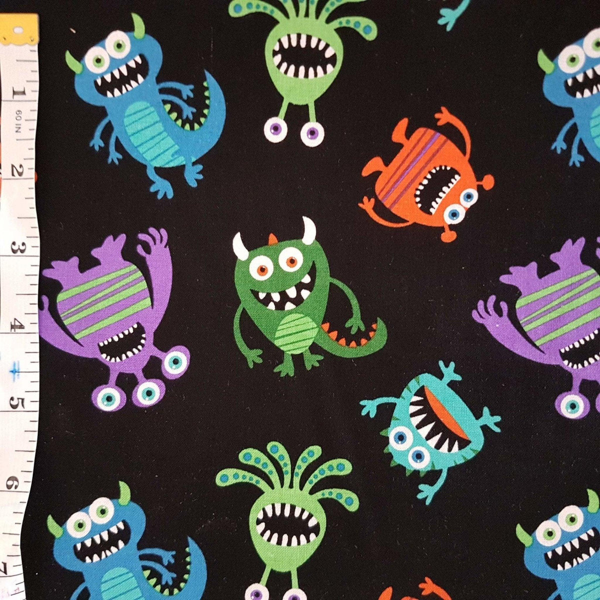 Tossed Doodle Monster Fabric on Black | Fabric Design Treasures